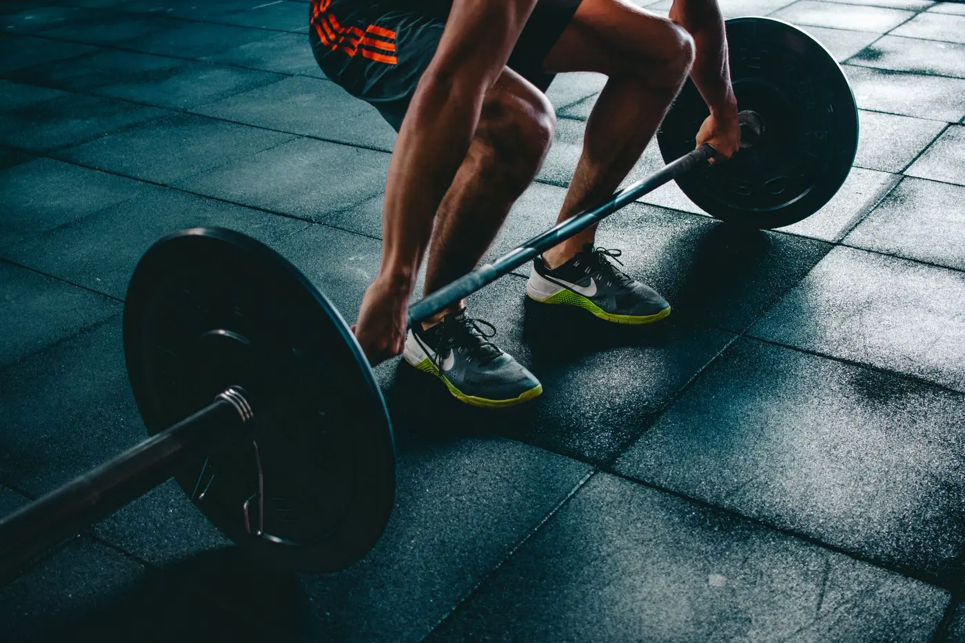 Athlete performing a barbell deadlift